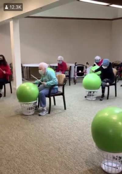 This nursing home has drum exercise classes for their residents and they love it (Green Country Village)