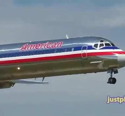 Classic move! American MD-80 Using thrust reverses to push itself back from the gate.