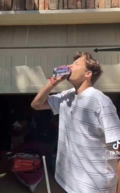 Chugging a sparkling water