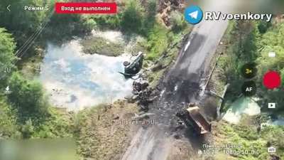 An abandoned Ukrainian BRDM-2 and other destroyed equipment at a crossing in the Kursk region - September 2024