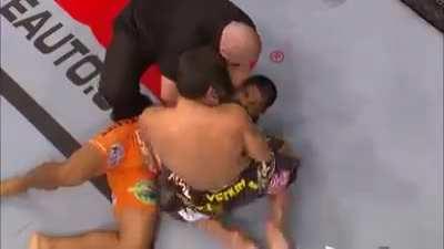 Machida showing respect and sportsmanship after a brutal kick.