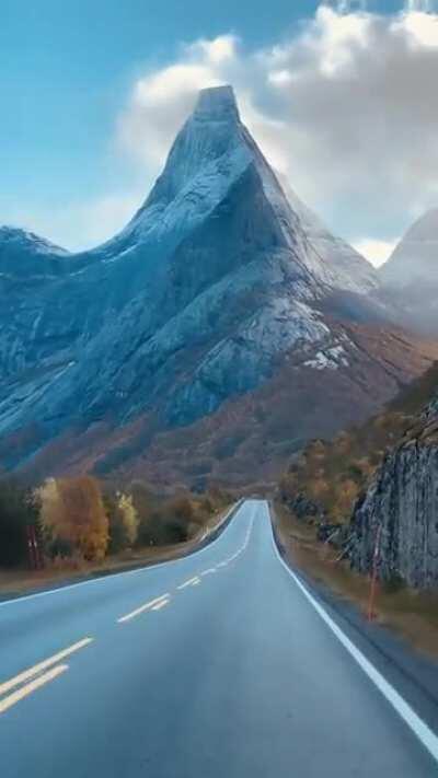 🔥 Stetind is Norway's national mountain, and no wonder. It's a perfect obelisk with sweeping ridges rising straight from the sea