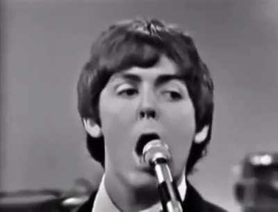 A clip of the Beatles performing I'm Down from Help!, Live.