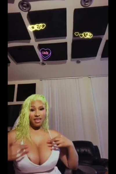 Nicki teasing with her juggs 😜