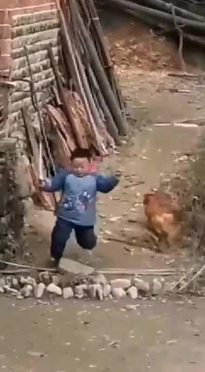 WCGW wielding a sword at a rooster?