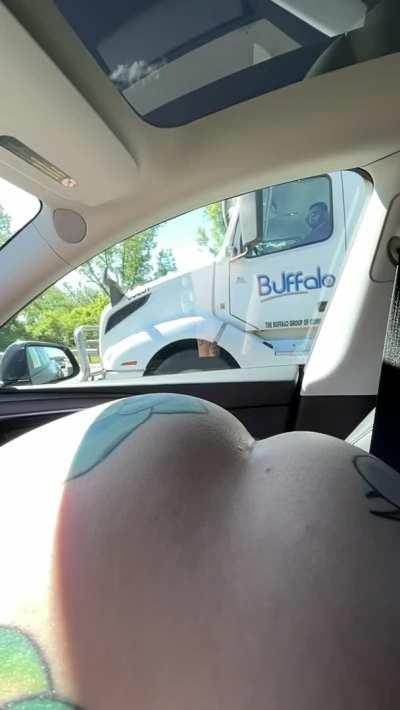 Showing some ass and pussy through the car window for our local truckers. 