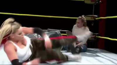 Penelopy Ford takes a chair from Taya Valkyrie (apologies if repost)