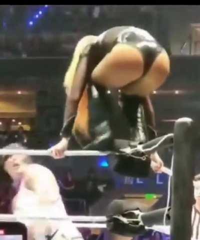 Rhea catches Becky as she climbs the turnbuckle