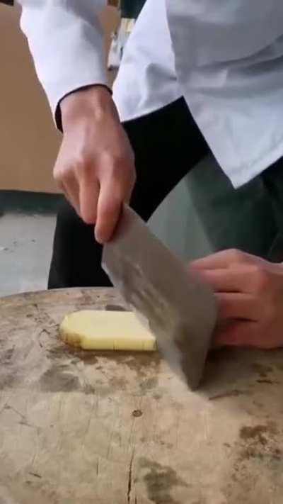 Cutting a potato