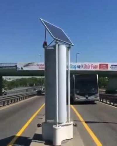 Traffic powered wind turbine