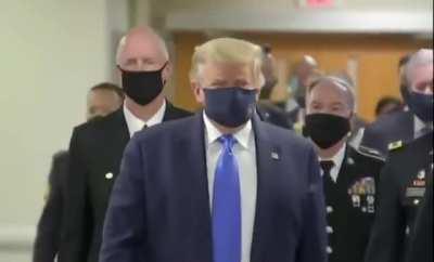 Donald Trump seen wearing a mask for the first time.