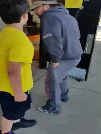 Kid tries to fight an older man