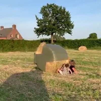 Wrapping hay bales the cheap way