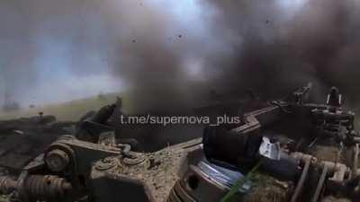 FPV of mine clearing vehicle clearing the way for the rest of the forces, presumably Ukrainian