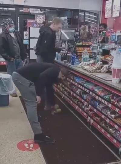 Guy yells at shopkeeper, attempts to kick guys soda and gets bitch slapped into next year