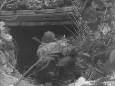 Marines of B Company, 1st Battalion, 5th Marine Regiment, 1st Marine Division Flushing Out a Japanese Hideout/Bunker, Peleliu 15 Sept 1944