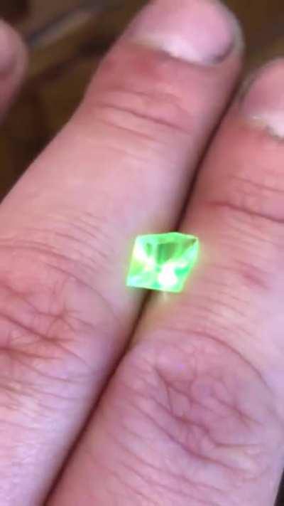 Uranium in this Hyalite Opal causes it to glow green when exposed to UV light.