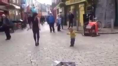 Little girl learns Irish tap dance.