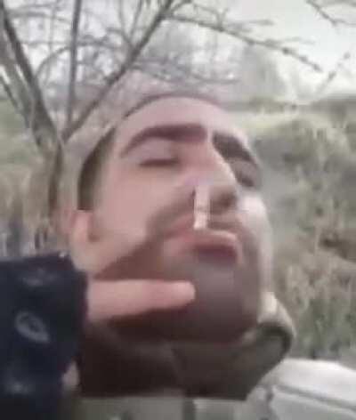 Azerbaijani soldier smoking cigarette while having a close call with an artillery round, Nagorno-Karabagh War 2020