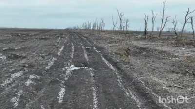 russian soldier after his position is bombed by a Ukrainian drone munition surrenders to a drone which leads him to a Ukrainian trench