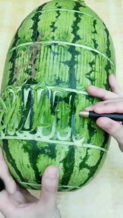 An expanding basket made up of a watermelon