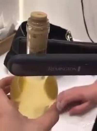 Opening a wine bottle with this method.