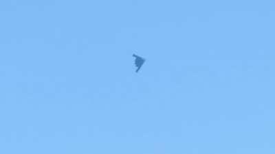 B2 Stealth Bomber flying over my property - sorry for the crappy camera work.