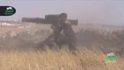 Opposition BGM-71 TOW team strike on an SAA tank exposed behind a berm - Aleppo - 8/5/2014