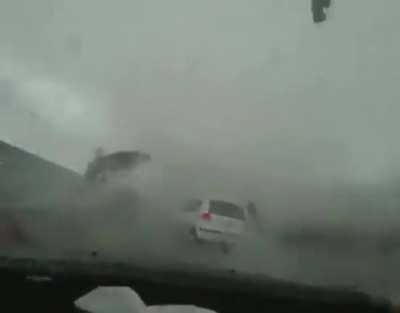 Tornado forms on car while driving