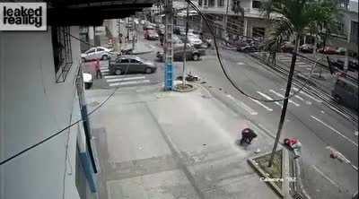 Car cuts off motorcycle.Passenger lands on head.