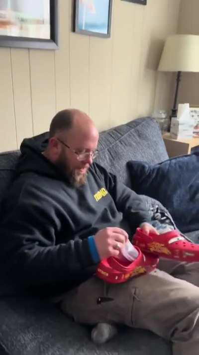 Wife surprises her husband a present. 