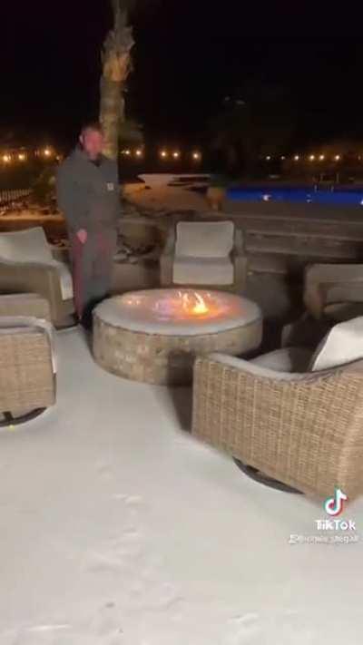 What happens when you light a propane fire pit covered in snow!