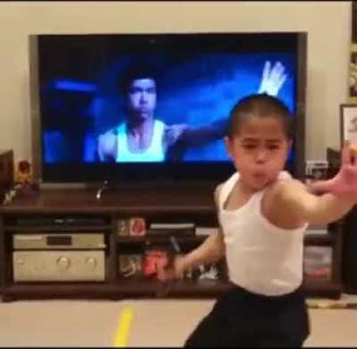 This kid replicating Bruce Lee's moves