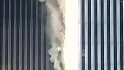 3 people falling from North tower shortly after it gets hit (Up close footage)