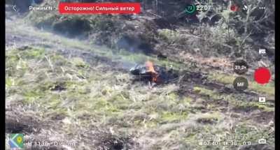 2 Russians on a bike try to assault a Ukrainian position while their comrades observe via a drone