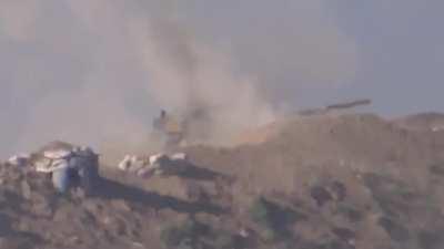 Opposition ATGM successfully targets a Syrian tank exposing its turret to engage targets - Hama - 5/20/2014