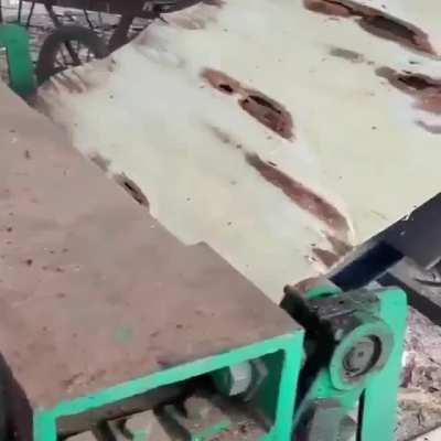 Turning a log into veneer.