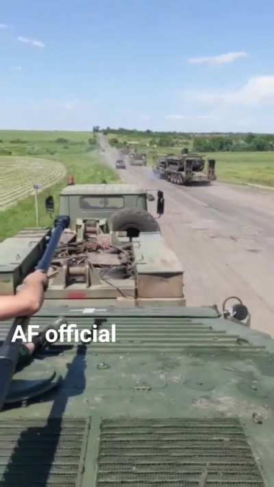 A convoy of Ukrainian BMPs on transporter trailers on the move. OPSEC statement in comments.