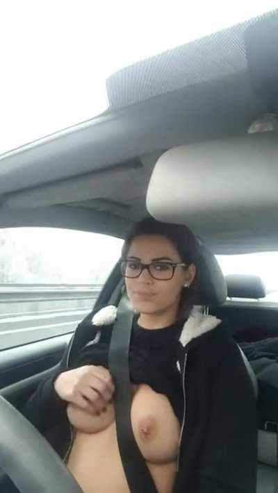 Beautiful Girl Playing With Her Tits While Driving