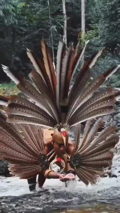 Dayak people’s traditional outfit and dance of Kalimantan (Indonesia Borneo)