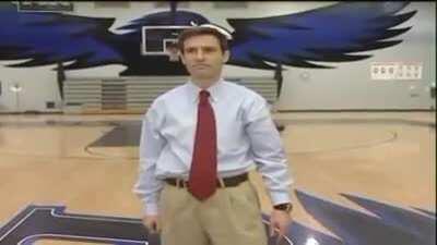 Reporter covering the story of coach who hit a blindfolded half court shot made one himself