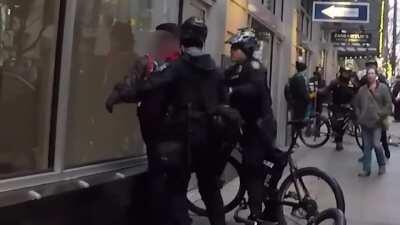 Seattle Police officers were recorded running into pedestrians with their bikes and arresting the victims for assault.