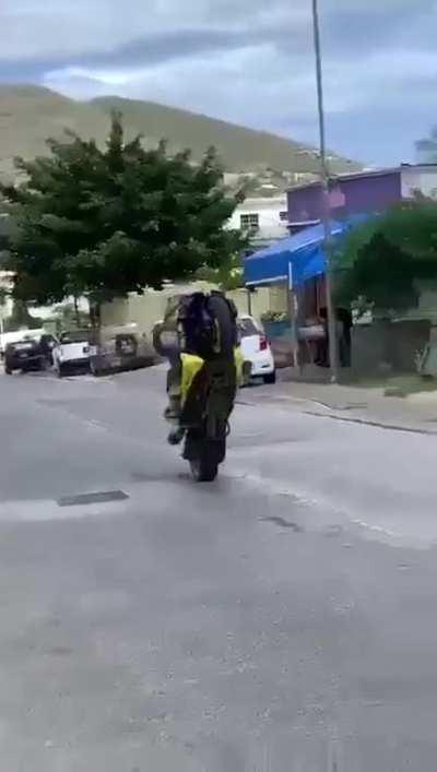 WCGW showing off pulling a wheelie ?