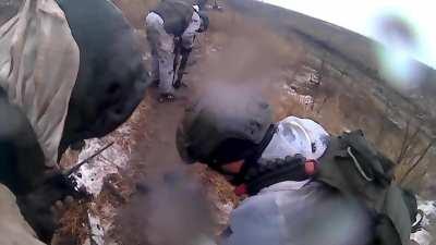 Russian soldiers GoPro films one of his comrades stepping on a AP mine