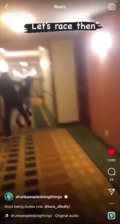 Drunk dudes racing in a hallway