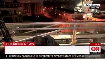 CNN reporter reacting live to the sound of explosion in Kyiv.