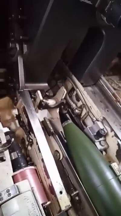 Inside view of an AHS Krab/AS-90 155mm howitzer firing at Russian targets. 11/2023