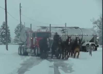 Using 4 Horse Power, a fueling tuck is pulled out of a stuck spot in ice.