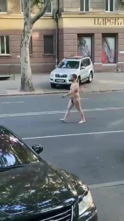 What coukd go wring just walking naked on the street forcing cars go around him