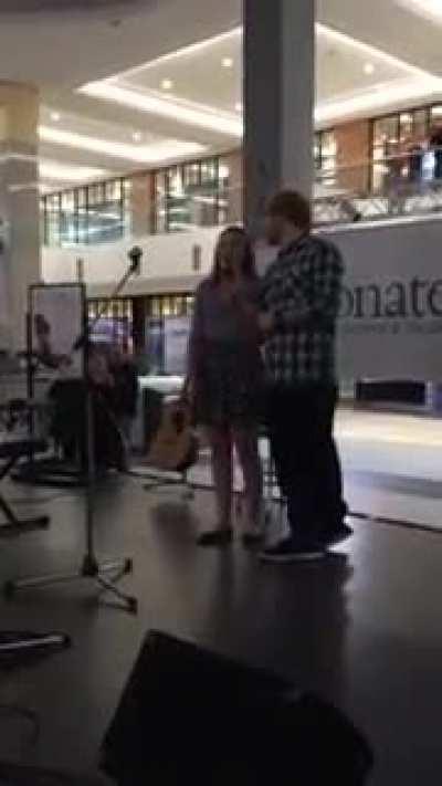 Ed Sheeran surprises someone singing his song by being her backup...